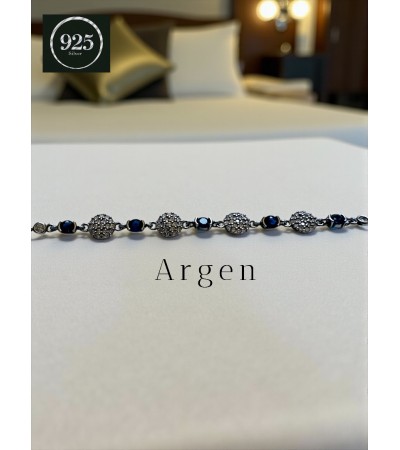 ELMAS KESİM ZİRKONİA TOPLU SİYAH VE BEYAZ BAGET KORDONLU GÜMÜŞ KADIN BİLEKLİK